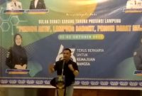 Ketua Karang Taruna Provinsi Lampung, Dendi Romadhona memberikan sambutan dalam Malam Ramah Tamah BBKT dan HUT Karang Taruna Ke-63 yang diadakan di Kabupaten Pesibar. Tangkapan Layar: Joni Irawan, Kabar Indonesia.