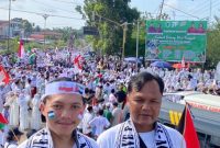 Ribuan warga Batanghari melakukan aksi massa dan long march mendukung kemerdekaan Palestina. Foto: Baidillah, Kabar Indonesia