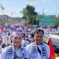 Ribuan warga Batanghari melakukan aksi massa dan long march mendukung kemerdekaan Palestina. Foto: Baidillah, Kabar Indonesia