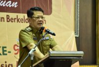 M. Firsada, Pj. Bupati Tulang Bawang Barat memberikan sambutan dalam rangka peringatan Hari Ibu Tahun 2024. Foto: Andi Rahman, Kabar Indonesia