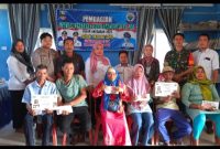 19 keluarga penerima manfaat (KPM) Pekon Padang Raya, Kecamatan Krui Selatan, Kabupaten Pesisir Barat menerima BLT DD Tahap Keempat pada Rabu (20/12/2023). Foto: Joni Irawan, Kabar Indonesia