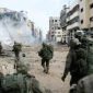 Pasukan Israel memasuki Jalur Gaza yang hancur akibat agresi militer mereka.