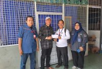 Personel Panwascam Labuhan Ratu sedang melakukan pengawasan terhadap kampanye yang dilakukan Partai Nasdem pada Kamis (14/12/2023). Foto: Ferry HT, Kabar Indonesia