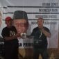 Koordinator Kegiatan Nobar Ganjar-Mahfud, Muhlasin memberikan sambutan saat Nobar Organ Relawan Ganjar-Mahfud Kabupaten Pringsewu pada Jum'at (22/12/2023). Foto: Budi Santoso, Kabar Indonesia