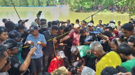 Polsek Gunung Agung, Tulang Bawang Barat melakukan identifikasi penyebab tenggelamnya dua bocah di bendungan Tiyuh Tunas Jaya pada Sabtu (6/4/2024). Foto: Andi Rahman, Kabarindonesia.co