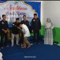 Pengurus KPPM Desa Bumi Pratama Mandira memberikan santunan pada 22 orang anak yatim pada Sabtu (6/4/2024). Foto: Taufiq Yusuf, Kabarindonesia.co