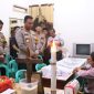Kapolres Tulang Bawang, AKBP James H. Hutajulu melayat ke rumah duka Alm. Antonius Ripto Basuki yang meninggal dunia saat melaksanakan tugas. Foto: Andi Rahman, Kabarindonesia.co