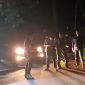 Polres Pesibar, Polda Lampung tengah cek TKP dugaan korban begal yang viral di TikTok. Foto: Joni Irawan, Kabarindonesia.co